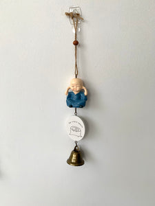 Hanging Buddha with a Bell.